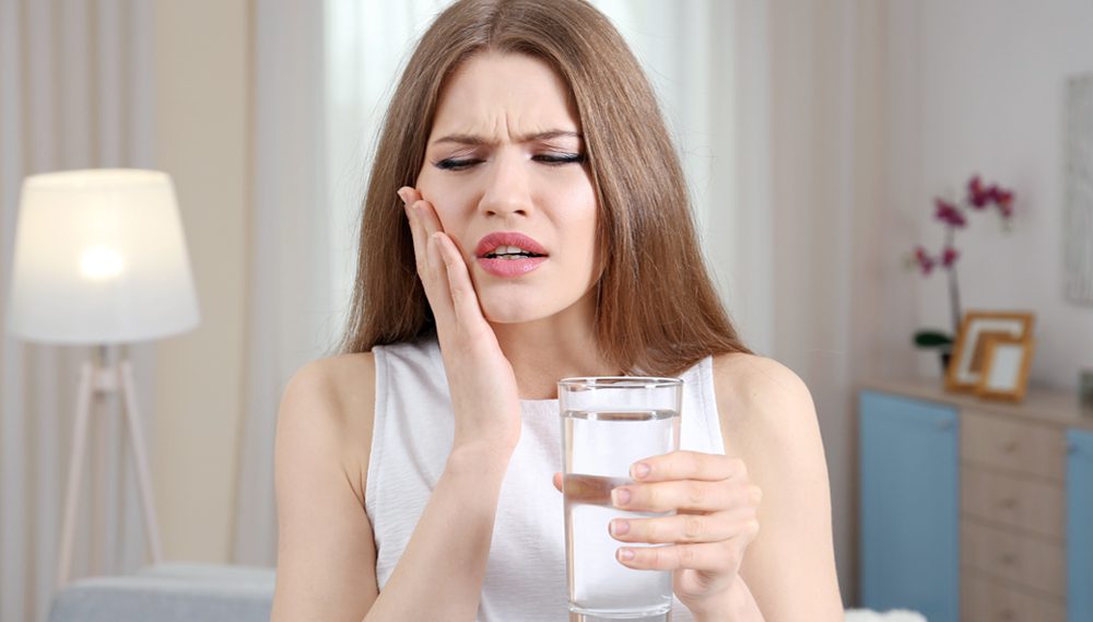 تسكين ألم الأسنان العصب في المنزل